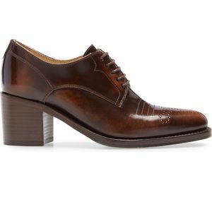 The Office of Angela Scott, Miss Button Derby